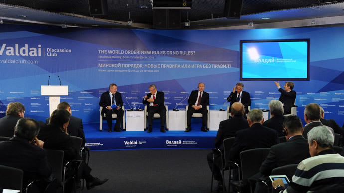 24 October 2014. Russian President Vladimir Putin (far center) at the wrap-up session of the 11th Meeting of the Valdai Discussion Club in Sochi.(RIA Novosti / Michael Klimentyev)