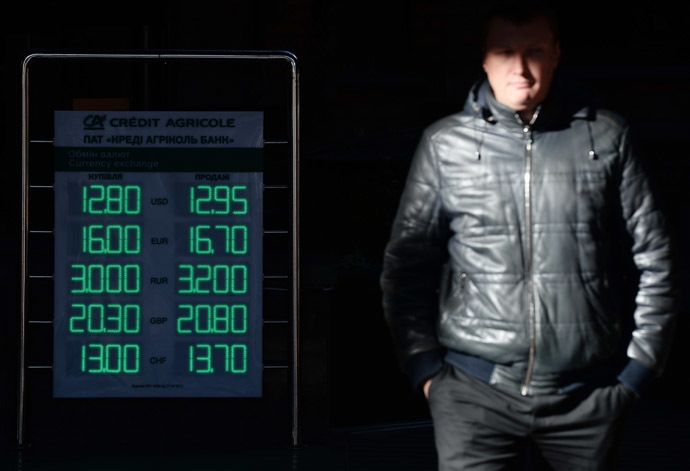 A sign showing currency exchange rates on a street in Kiev. (RIA Novosti/Maksim Blinov)