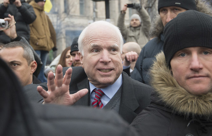 US Senator John McCain, center, at the Dignity Day rally held by supporters of eurointegration on Maidan Nezalezhnosti in Kiev. (RIA Novosti/Iliya Pitalev)