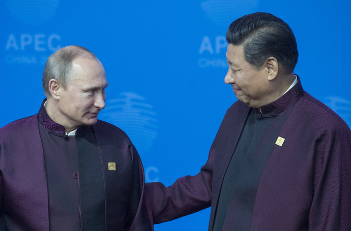 Russian President Vladimir Putin, left, and Chinese President Xi Jinping (RIA Novosti/Sergey Guneev)