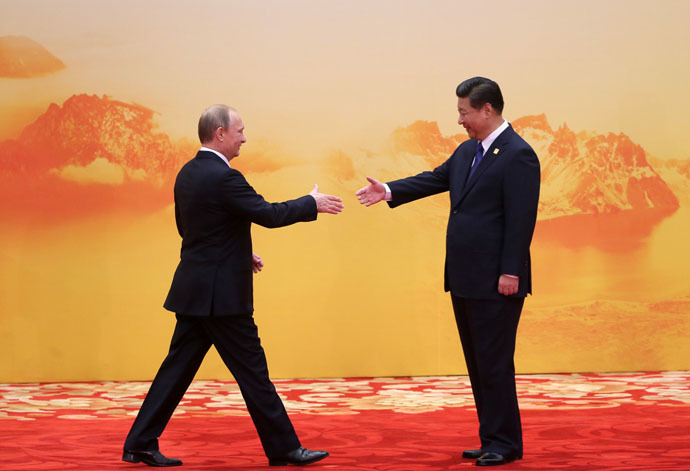 Russian President Vladimir Putin, left, and Chinese President Xi Jinping (RIA Novosti)