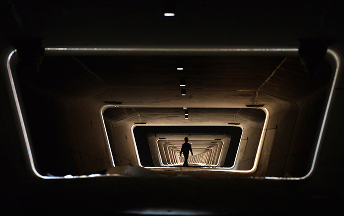 A worker walks in the foundation of a new railway line in Yiwu, Zhejiang province (Reuters / China Daily)