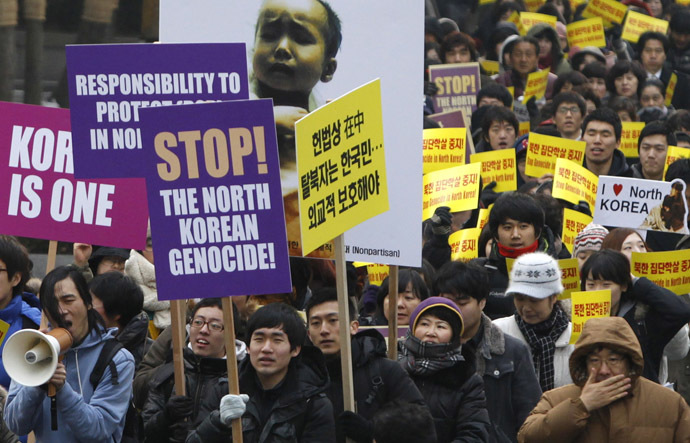 South Korean Christians and former North Korean defectors living in the South march during a rally to protest against what they say is North Korea's violation of human rights, in Seoul January 27, 2012. (Reuters/Kim Hong-Ji )