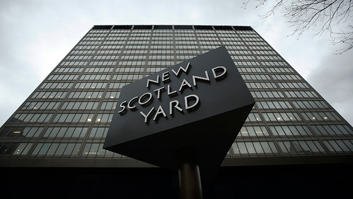 A sign is seen outside New Scotland Yard in central London (Reuters / Luke MacGregor)