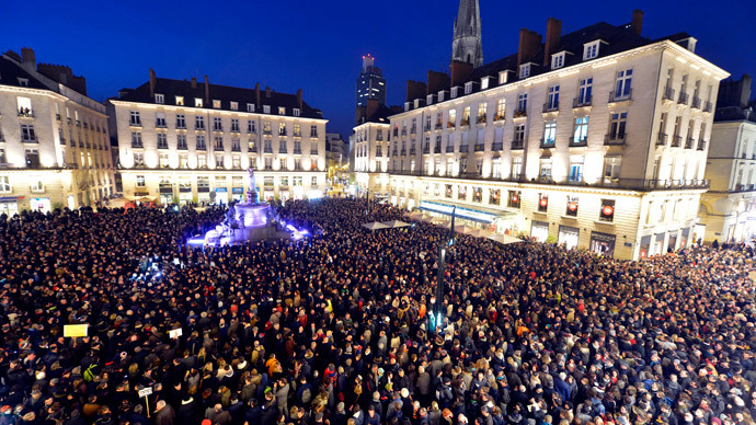 People gather at the Place Royale in Nantes on January 7, 2015.(AFP Photo / Georges Gobet)