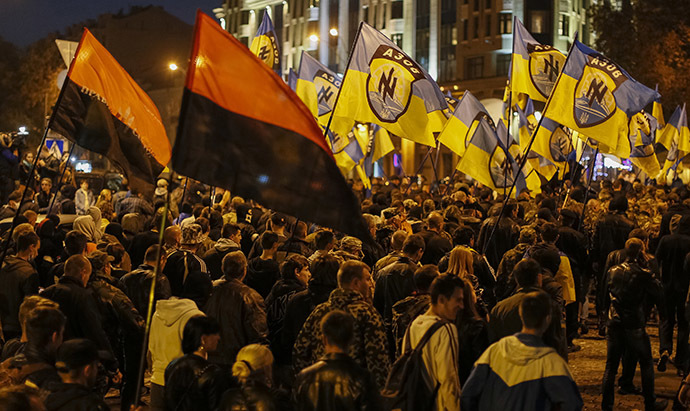 Activists of the Ukrainian nationalist parties take part in a procession to mark the Day of Ukrainian Cossacks to honour the role of the movement in Ukraine's history, in Kiev. (Reuters/Gleb Garanich)