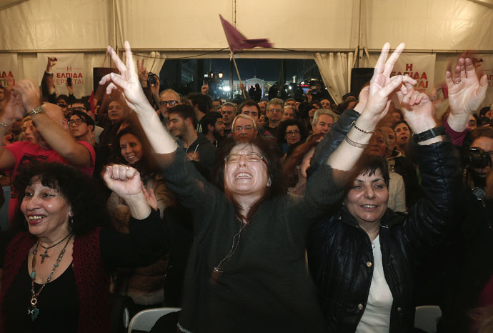 Supporters of radical leftist Syriza party celebrate in Athens January 25, 2015. (Reuters/Yannis Behrakis)