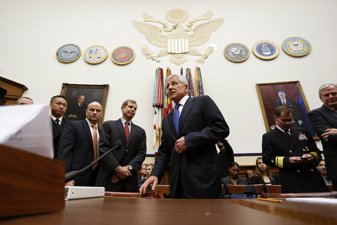 U.S. Defense Secretary Chuck Hagel takes his seat to testify about the Bergdahl prisoner exchange, at a House Armed Services Committee hearing on Capitol Hill in Washington June 11, 2014. (Reuters)