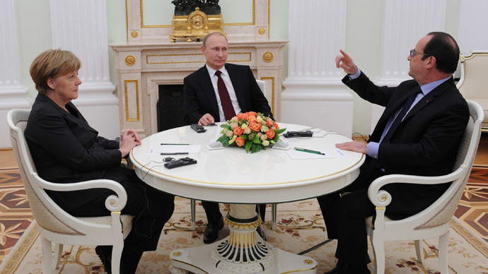  February 6, 2015. Russian President Vladimir Putin, Federal Chancellor of Germany Angela Merkel and President of France Francois Hollande, right, during a meeting in Kremlin. (RIA Novosti/Michael Klimentyev)