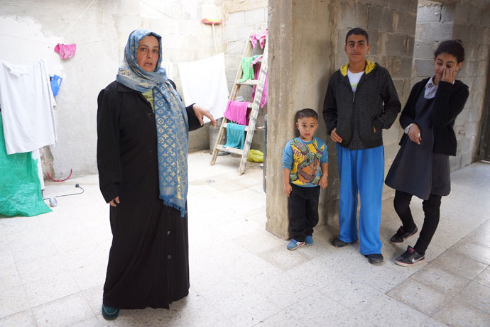 The authorities come in every day to check whether the family repaired the roof â the town council banned them to put on a roof. (Photo by Nadezhda Kevorkova)