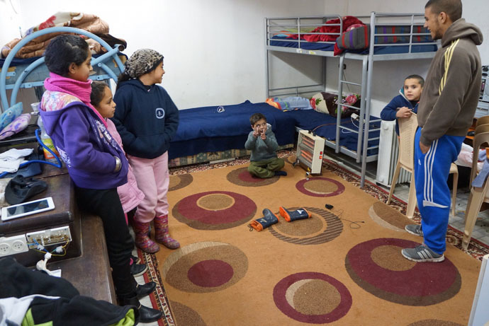 The childrenâs room in the makeshift home can be demolished any minute without notice (Photo by Nadezhda Kevorkova)