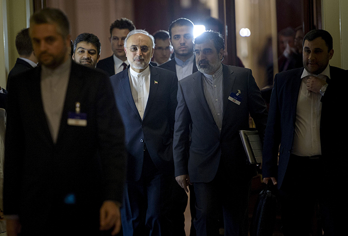 Head of Iranian Atomic Energy Organization Ali Akbar Salehi walks with others during a break in a meeting with world representatives seeking to pin down a nuclear deal with Iran at the Beau Rivage Palace Hotel in Lausanne March 31, 2015 (Reuters / Brendan Smialowski)