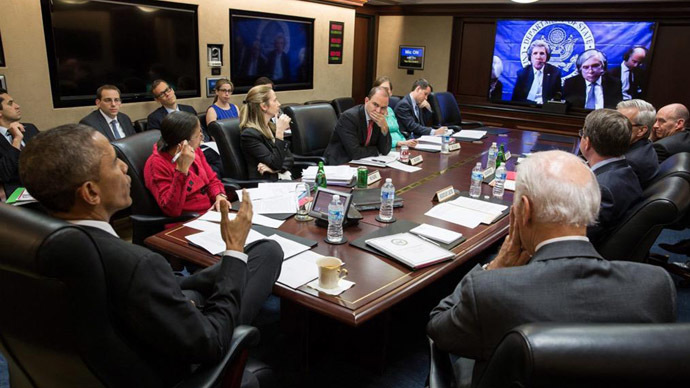 U.S. President Barack Obama (L) receives an update April 1, 2015 in the Situation Room at the White House in Washington from Secretary of State John Kerry during the Iran nuclear talks in this White House handout photo. (Reuters)