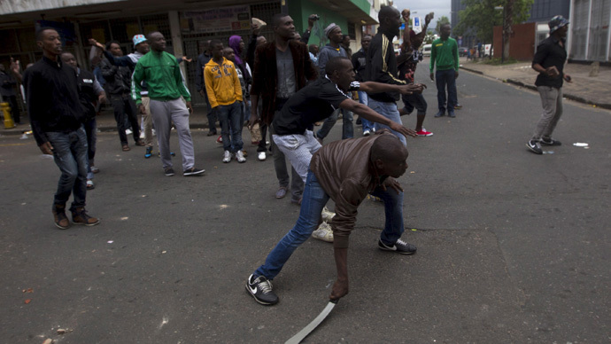 Specter of apartheid in South Africa's violence