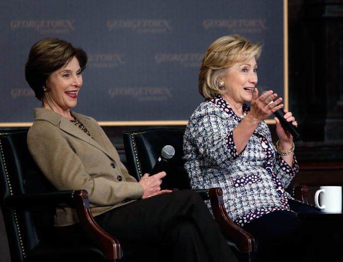 Former U.S. Secretary of State Hillary Clinton (R) and former first lady Laura Bush (Reuters / Jason Reed)