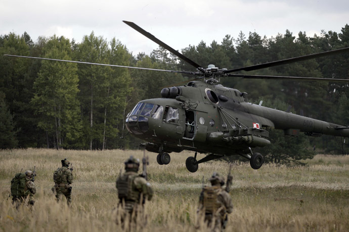 A Mi-17 helicopter lands during the "Noble Sword-14" NATO international tactical exercise at the land forces training centre in Oleszno, near Drawsko Pomorskie, northwest Poland. (Reuters/Kacper Pempel)