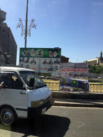 Photos of Martyrs in the fight against ISIS adorn the streets of Baghdad (Photo by Eisa Ali) 