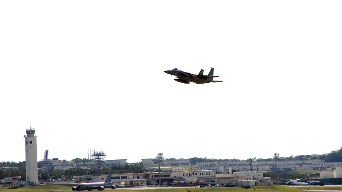 Okinawa: USAF F-15 overflying Kadena air base.(Photo by Andre Vltchek)