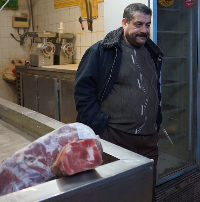Usama in his butcher shop (Photo by Nadezhda Kevorkova)