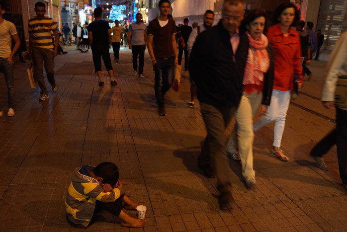 âHe just wants money,â passers-by were saying, pointing at a barefooted boy on the most expensive street in Istanbul 