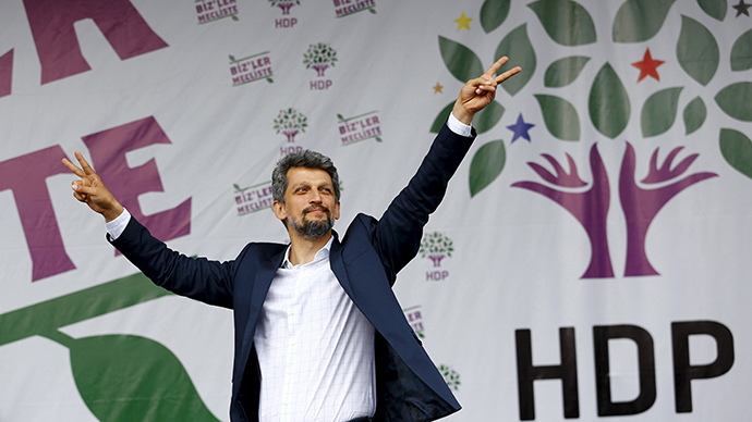 Garo Paylan, newly elected Armenian lawmaker from the Pro-Kurdish Peoples' Democratic Party (HDP), greets supporters during a gathering to celebrate the party's victory during the parliamentary election, in Istanbul, Turkey, June 8, 2015 (Reuters / Murad Sezer)