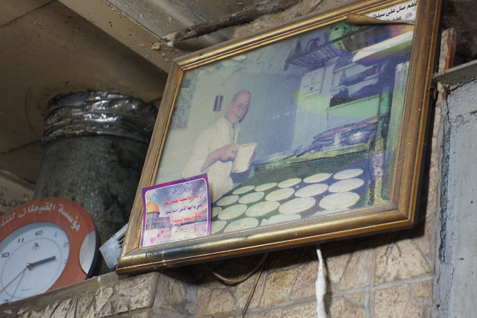A photo of Ghaziâs father on the wall. He was a cook (photo by Nadezhda Kevorkova)