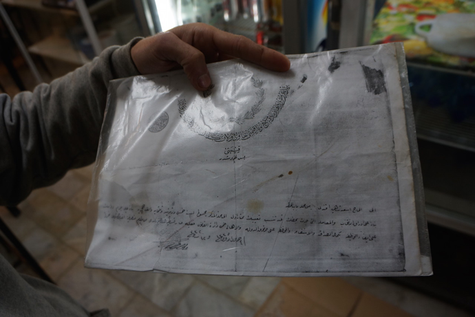 A copy of documents to the property. If the family fail to pay taxes, they will lose the restaurant (photo by Nadezhda Kevorkova)