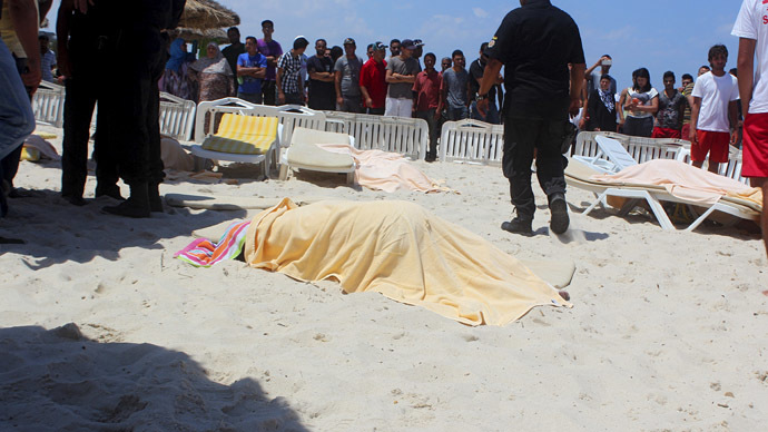 The body of a tourist shot dead by a gunman lies near a beachside hotel in Sousse, Tunisia June 26, 2015. (Reuters / Amine Ben Aziza)