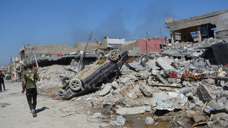 Scènes de désolation à Mossoul après une frappe aérienne de la coalition 