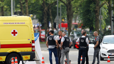 Les membres des forces de l'ordre sur les lieux du drame à Liège