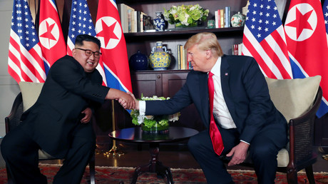 Kim Jong-un et Donald Trump lors de leur rencontre historique à Singapour, le 12 juin