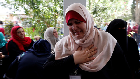 Une employée de l'UNRWA réagissant à l'annonce de l'organisation de licencier 250 personnes, à Gaza, le 25 juillet 2018