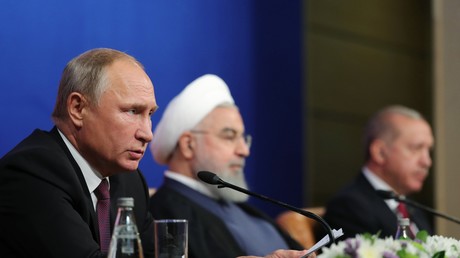 Le président russe Vladimir Poutine, le président iranien Hassan Rouhani et le président turc Recep Tayyip Erdogan assistent à une conférence de presse à l'issue de leur réunion sur la Syrie organisée à Téhéran, le 7 septembre 2018  (image d'illustration). 