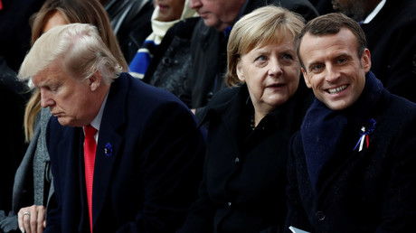 Le président français Emmanuel Macron, la chancelière allemande Angela Merkel, le président américain Donald Trump, assistent à la cérémonie commémorative du Jour de l'Armistice, à l'Arc de Triomphe à Paris, France, le 11 novembre 2018.