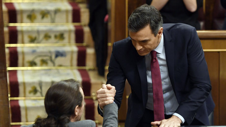 Sanchez reconduit à la tête du gouvernement espagnol, vers une coalition inédite avec Podemos