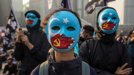 Des manifestants participent à rassemblement à Hong Kong le 22 décembre 2019 en soutien à la minorité ouïghoure de Chine (image d'illustration).