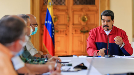 Nicolas Maduro s'exprimant concernant la pandémie du nouveau coronavirus, COVID-19, au palais présidentiel de Miraflores à Caracas, le 22 mars 2020.