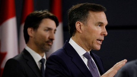 Embourbé dans un scandale, le ministre canadien des Finances démissionne