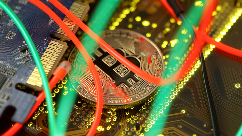 Nouveau record pour le bitcoin, qui dépasse les 62 000 dollars