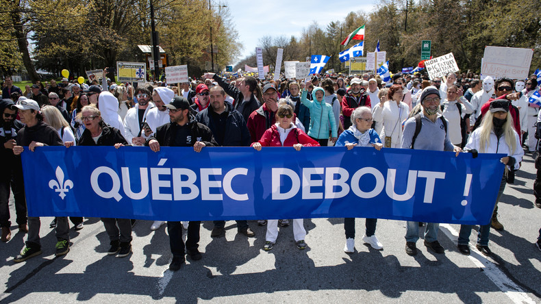 Canada : des dizaines de milliers de personnes manifestent contre les mesures sanitaires à Montréal