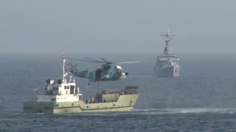 Des navires de guerre dans le golfe d'Oman lors d'exercices navals menés conjointement par la Chine, l'Iran et la Russie le le 21 janvier 2022.