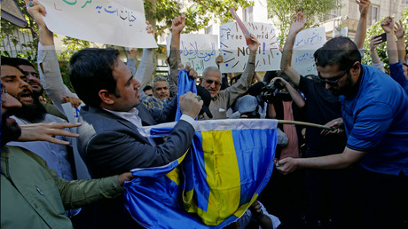 Suède : un nouvel exemplaire du Coran brûlé lors d'une manifestation à Stockholm