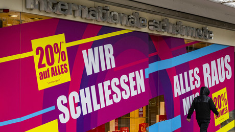Inscription «Nous fermons, réduction de 20% sur tous les produits» dans un magasin berlinois. L'Allemagne fait partie des pays les plus touchés par les faillites dans l'Union européenne.