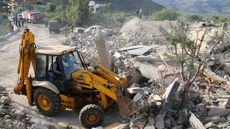 Un bulldozer déblaye les décombres d'un bâtiment détruit par une frappe israélienne dans le village frontalier de Kfar Hamam, dans le sud du Liban, le 17 mai 2024 (photo d’illustration).