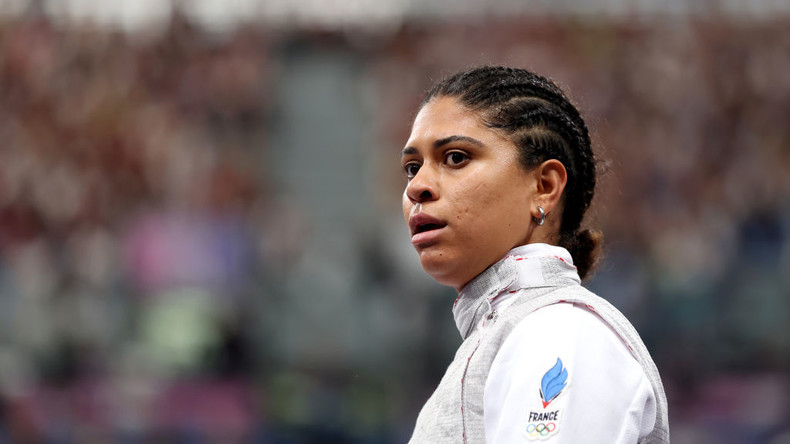 Des baisers fatals qui ont failli coûter les Jeux olympiques à une athlète française