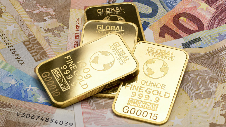 Le Monde: рекордный спрос на золото говорит о росте недоверия к доллару
