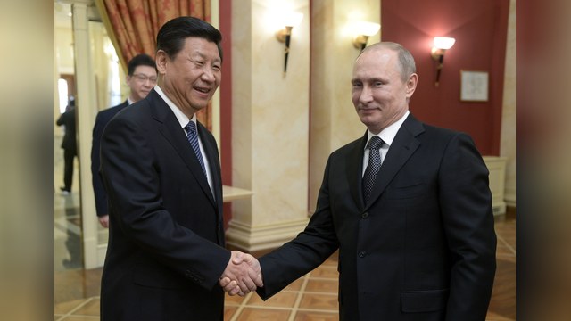 Time: Санкции Запада толкают Путина на Восток