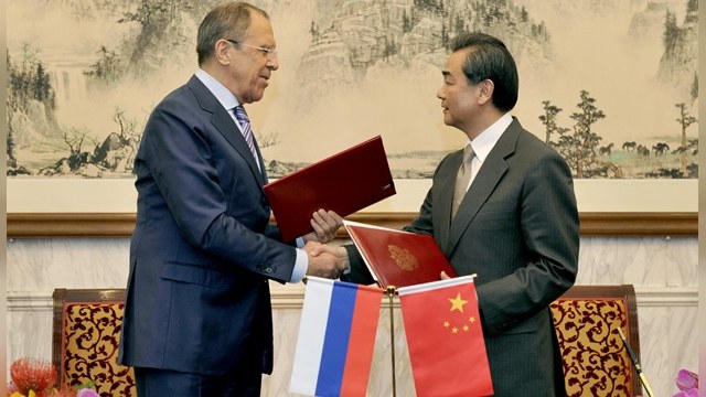 Россия и Запад соревнуются за симпатии Китая в украинском споре