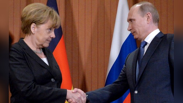 Меркель и Путин выразили обеспокоенность насилием на Украине