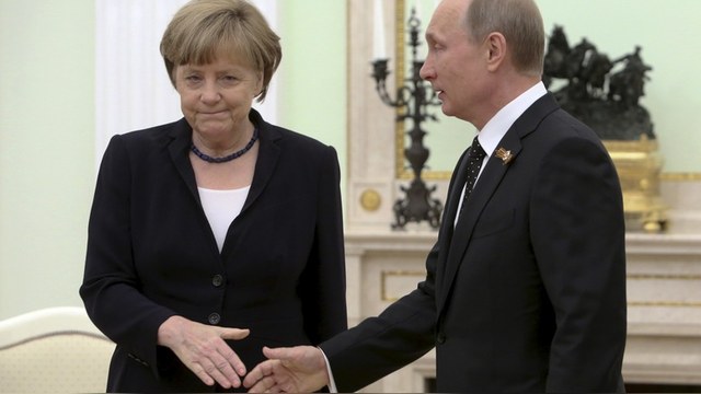 Меркель опередила Путина в рейтинге AFP